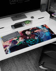 Workspace-ready 36x16 inch desk pad with Tanjiro and Nezuko's fierce determination, ideal for enthusiasts