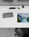 14x10 inches mouse pad featuring towering fjord cliffs, cascading waterfalls, and reflective emerald waters for a tranquil workspace.