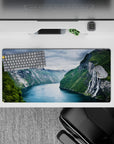 32x16 inches mouse pad showcasing towering fjord cliffs and cascading waterfalls, with reflective emerald waters for peaceful adventure.