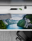 36x16 inches mouse pad with towering fjord cliffs, waterfalls, and emerald waters, evoking a sense of adventure and peace.