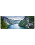 Compact 32x12 inches mouse pad featuring fjord cliffs, cascading waterfalls, and emerald waters for a tranquil, adventurous workspace.