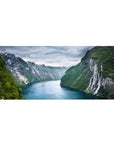 Mouse pad with towering fjord cliffs, 36x16 inches, cascading waterfalls, and emerald waters for a tranquil, adventurous workspace.
