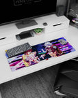 Shiro in violet dress beside Sora in yellow hoodie, rivals playing cards anime mouse pad 32x12 inches.