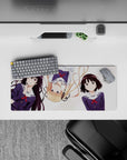 28x12 inches kawaii desk mat in soft pastels with navy uniforms and bright red ribbons, tidy vibe.