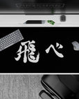 40x20 inches minimalist anime mouse pad in high-contrast black and white, calm focused manga vibe.