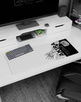 Towering anime figure and wired robotic hand reaching into space on mouse pad 32x12 inches.