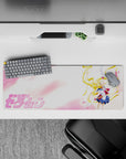 32x12 inches desk mouse pad in dreamy pastel pink clouds, navy and white sailor outfit, clean negative space.