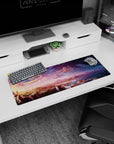 Serene 32x12 mouse pad featuring waterfalls, mountains, and a magical sunset turning into a starry night for a peaceful, inspiring desk environment