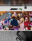 Anime desk pad 40x20 inches featuring KonoSuba's Aqua, Kazuma, Megumin, and Darkness in a chaotic tavern scene.