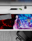 Nezuko anime desk pad 36x16 inches with red and blue worlds, pink kimono, capturing duality and emotion.