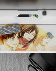 Childhood joy 36x16 desk pad with Eren, Mikasa, and Armin captured in watercolor hues, evoking nostalgia for their bond before the war began