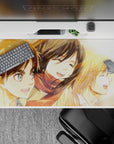 Nostalgic 40x20 desk pad with Eren, Mikasa, and Armin in warm watercolor hues, perfect for fans who treasure their childhood friendship