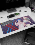 Artistic 36x16 inches mouse pad featuring Zero Two and Ichigo in modern streetwear, with sakura petals and cyberpunk details for a trendy anime-inspired effect.