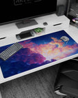 Howl and Sophie floating in a dreamy sky beside a giant winged creature on an anime desk pad 40x20 inches.