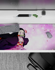 Anime desk pad featuring Nezuko from Demon Slayer, 36x16 inches, with sakura petals and vivid eyes for a vibrant desktop.