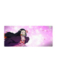 Nezuko anime mouse pad 28x12 inches, featuring vivid eyes, sakura petals, and pastel tones, blending charm and energy.
