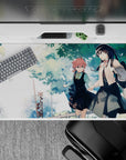 Pastel watercolor anime girl desk pad 40x20 inches, soft greens and sky whites for a calm study vibe.