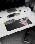 28x12 inches anime mouse pad featuring shy silver-haired girl holding a tiny camera, frilly skirt and pout.