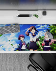 Sunny cobalt-sky anime girl desk pad 36x16 inches with bright uniforms and soft blush tones.