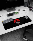 32x12 inches Naruto mouse pad featuring Itachi Uchiha perched in calm crow pose beneath a red moon.