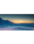Morning light 36x16 desk pad with snow-capped peaks, soft blue mist, and a warm glowing sky, perfect for a calming, inspiring desk setup