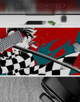 Dynamic 40x20 inch anime desk pad showcasing Tanjiro's fierce determination and iconic sword stance