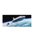 Space-themed 28x12 inches mouse pad with silver spaceship above clouds and ocean horizon on black sky.