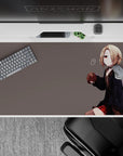 Moody lo-fi vibe anime desk pad 40x20 inches in soft gray, warm reds, and dark hoodie tones.