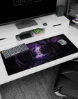 Anime desk pad 36x16 inches showing a lone brave figure by a glowing waterfall in a purple forest mist.