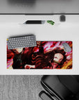 Compact yet detailed 28x12 inch mouse pad showcasing the raw energy of Tanjiro and Nezuko for fans