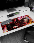 Workspace-ready 36x16 inch desk pad with flame-themed art of Tanjiro and Nezuko, ideal for fans
