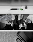 Dark black-and-gray anime desk pad 36x16 inches, dramatic yet cozy monochrome cityscape vibe.