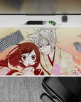 Warm peach and blush pink anime desk pad 40x20 inches with calming romance, soft lines and drifting sakura.