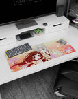 32x12 inches anime mouse pad showing fox boy in paw-print kimono leaning close to scarfed girl.