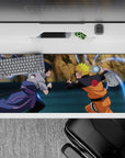 36x16 inches anime desk pad in warm oranges and cool grays with electric blue crackle, high-energy mood.