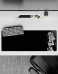 32x12 inches black mouse pad with moody white linework, icy grin, and sharp gothic vibe.