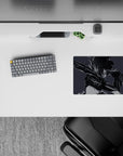 Moody monochrome anime girl mouse pad 14x10 inches in smoky gray tones, sharp black lines and glossy highlights.