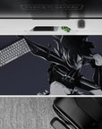 Moody monochrome anime girl desk pad 40x20 inches in smoky grays with bold ink strokes and gloss.