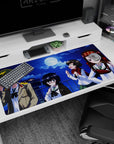 Rooftop moon scene anime girl desk pad 40x20 inches featuring four playful girls posing with snacks.