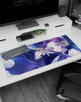Artistic 36x16 inches desk pad featuring Shinobu Kocho surrounded by ethereal butterflies and glowing blues, ideal for fans of serene anime designs.