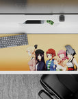 36x16 inches kawaii anime desk pad in soft peach tones, bright and cheeky mood for gaming or study.