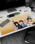 Anime girl desk pad 40x20 inches featuring a blonde with bow plus beret girl, pink wink, redhead, glasses.