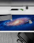 Deep ocean blue desk pad 36x16 inches with dreamy star specks and warm creamy galaxy core.
