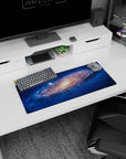 Space vortex scene 28x12 inches mouse pad featuring a creamy galaxy core surrounded by blue swirls.
