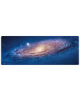 Cosmic spiral galaxy desk mouse pad, 32x12 inches, with starry swirl design for gaming and work.