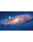 Cosmic spiral galaxy desk pad 40x20 inches with star-speckled swirl design for keyboard and mouse.