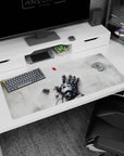 36x16 inches anime desk pad showing shattered robotic hand, scattered screws and wires, hovering red gem.
