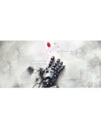 36x16 inches anime desk pad with broken robot hand on cracked white floor, floating red gem, pixel notes.