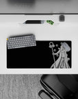 28x12 inches anime mouse pad with black backdrop, silver-white cloak contrast, calm dark Naruto vibe.