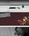Chibi Megumin anime mouse pad, 36x16 inches, with brown backdrop, red accents, fire-tipped hat, signature staff, sparks.